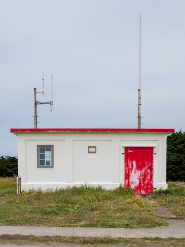 Red-and-beige lighthouse annex Red-and-beige lighthouse annex